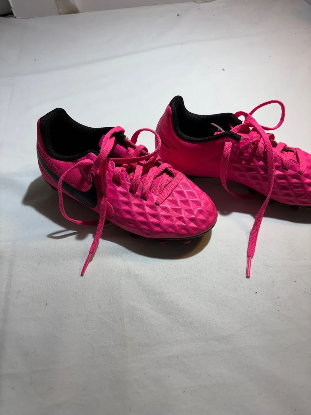 Kids Pink Nike cleats sz 12c